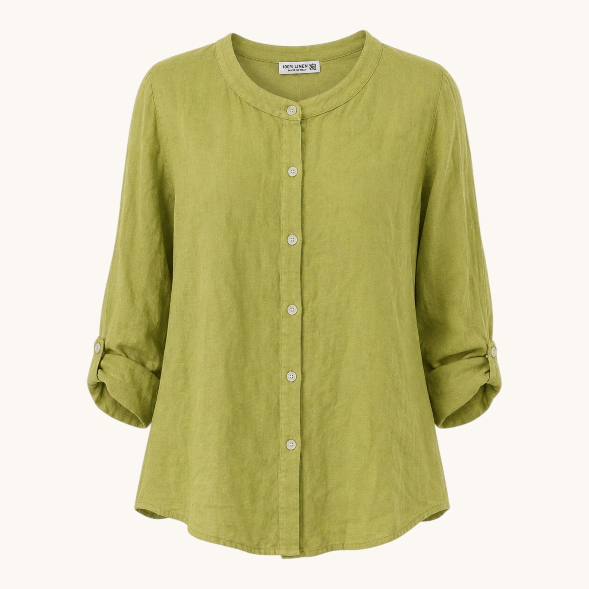 Feather & Sole green linen collarless shirt with long sleeves and a relaxed fit.