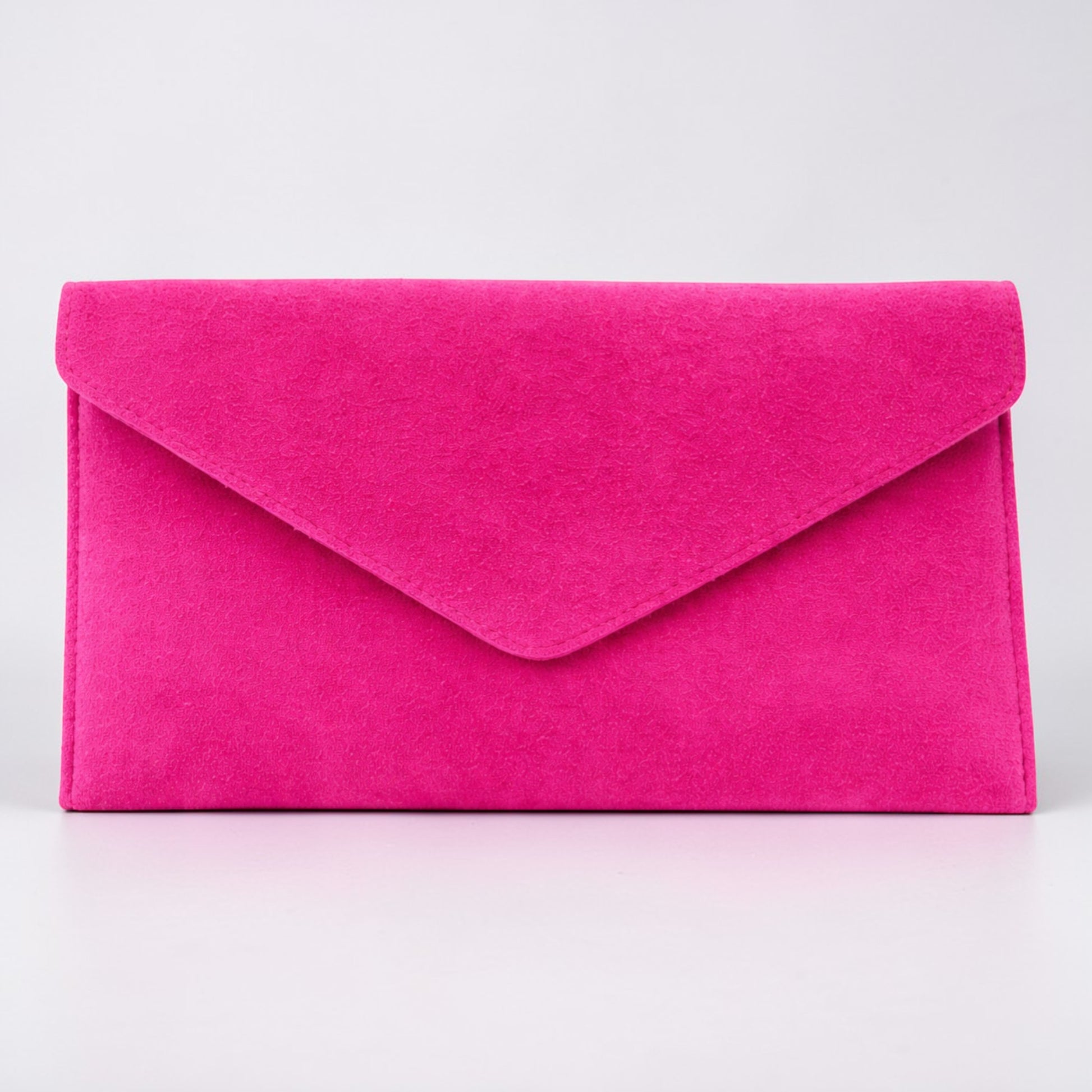 Pink clutch bag on a light gray background