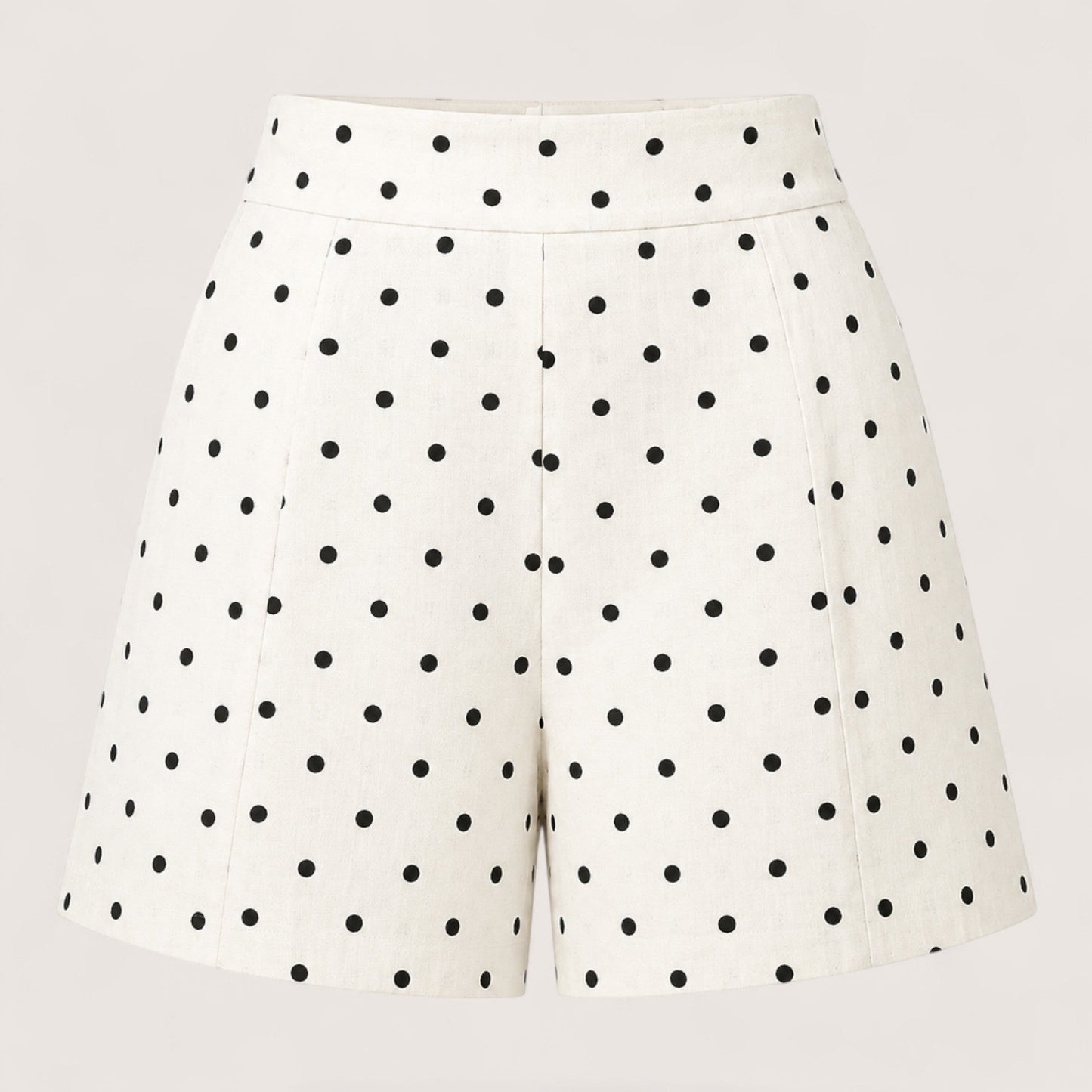 Feather & Sole white linen-blend shorts with black polka dots, featuring a high waist and tailored fit.