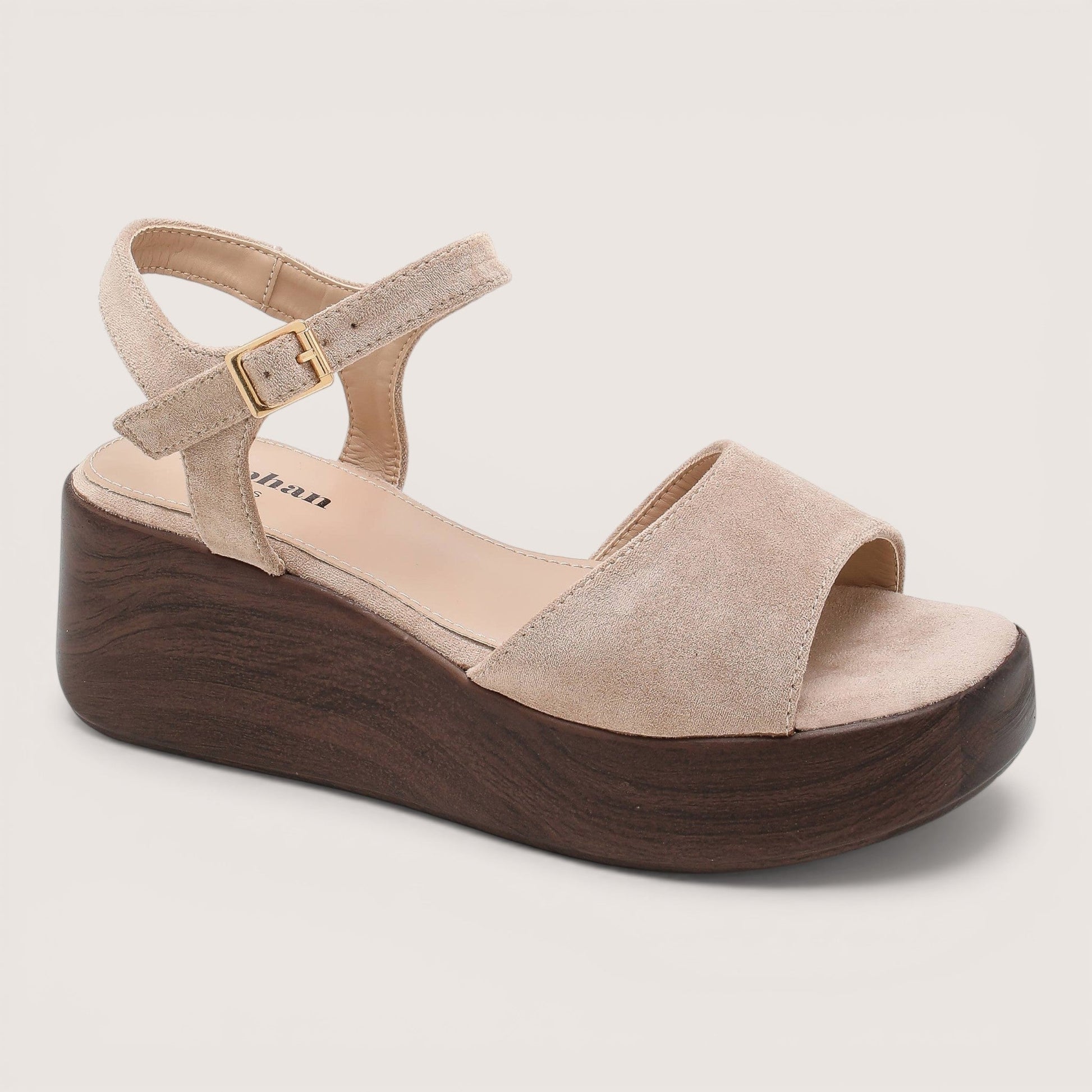 Feather & Sole beige suede-like flatform wedge sandals with wood-effect sole and adjustable ankle strap.