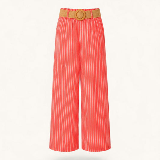 Feather & Sole coral high-waisted wide-leg trousers with white vertical stripes and a woven rattan buckle belt.