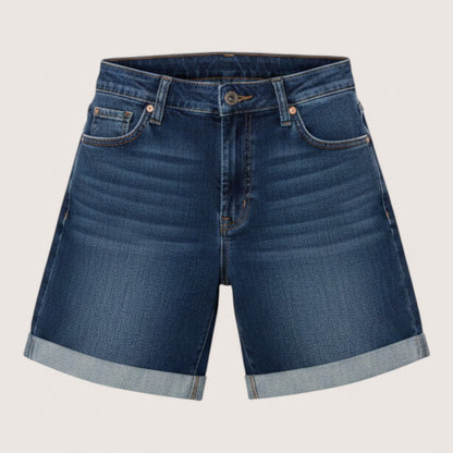 Feather & Sole dark blue stretch denim shorts with cuffed hems and high waist. Model is 169cm tall.