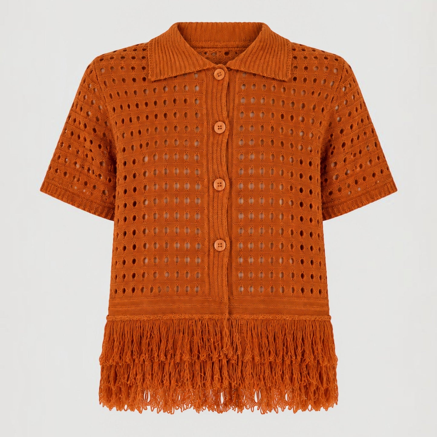 Feather & Sole orange knit short-sleeved collared top with open crochet detail and fringe hem.