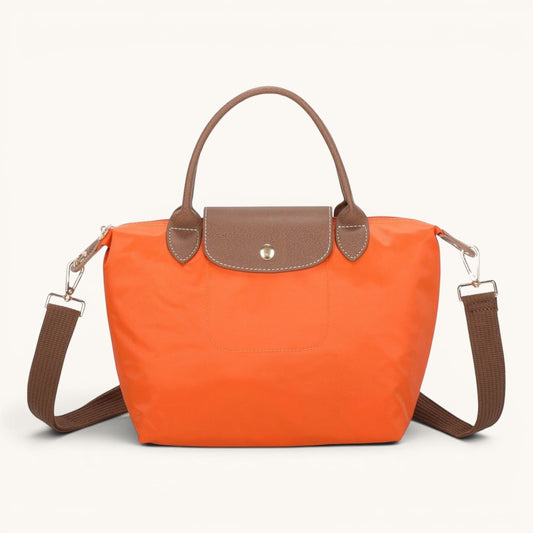 Feather & Sole orange nylon satchel handbag with brown faux leather trim and shoulder strap.