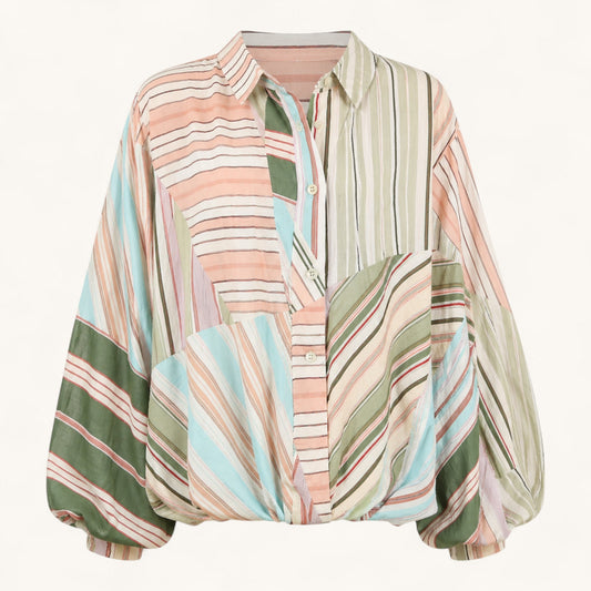 Feather & Sole pink, green, and blue patchwork stripe button-down shirt made of viscose and tencel with balloon sleeves.