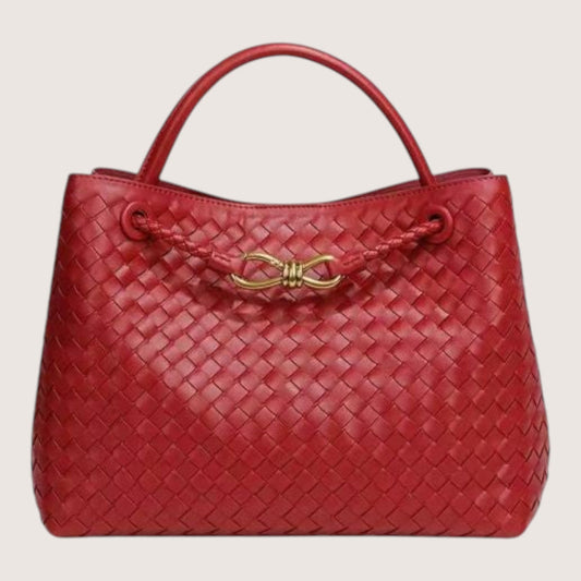 Feather & Sole red woven leather tote bag with braided detail and gold-tone clasp closure.