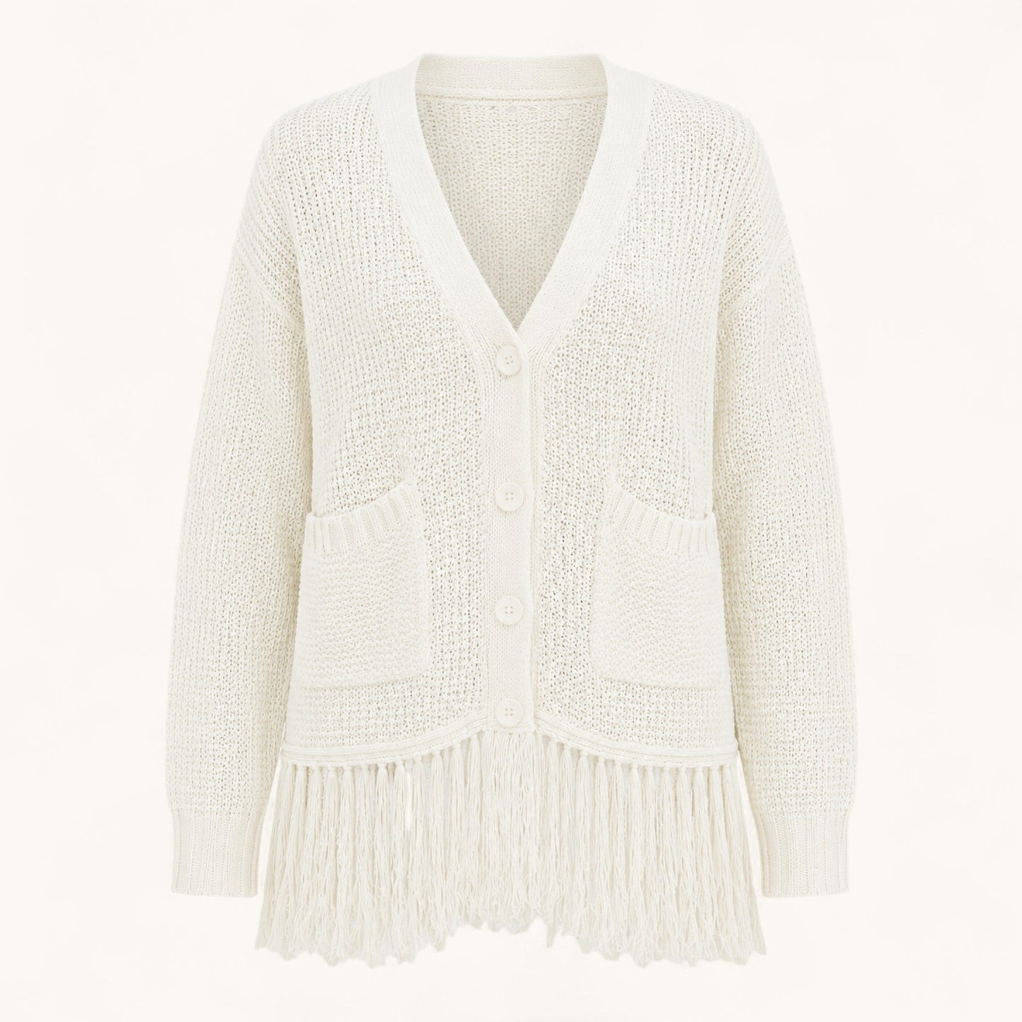 Feather & Sole white crochet knit cardigan with fringe hem, V-neck, button front, and two front pockets.