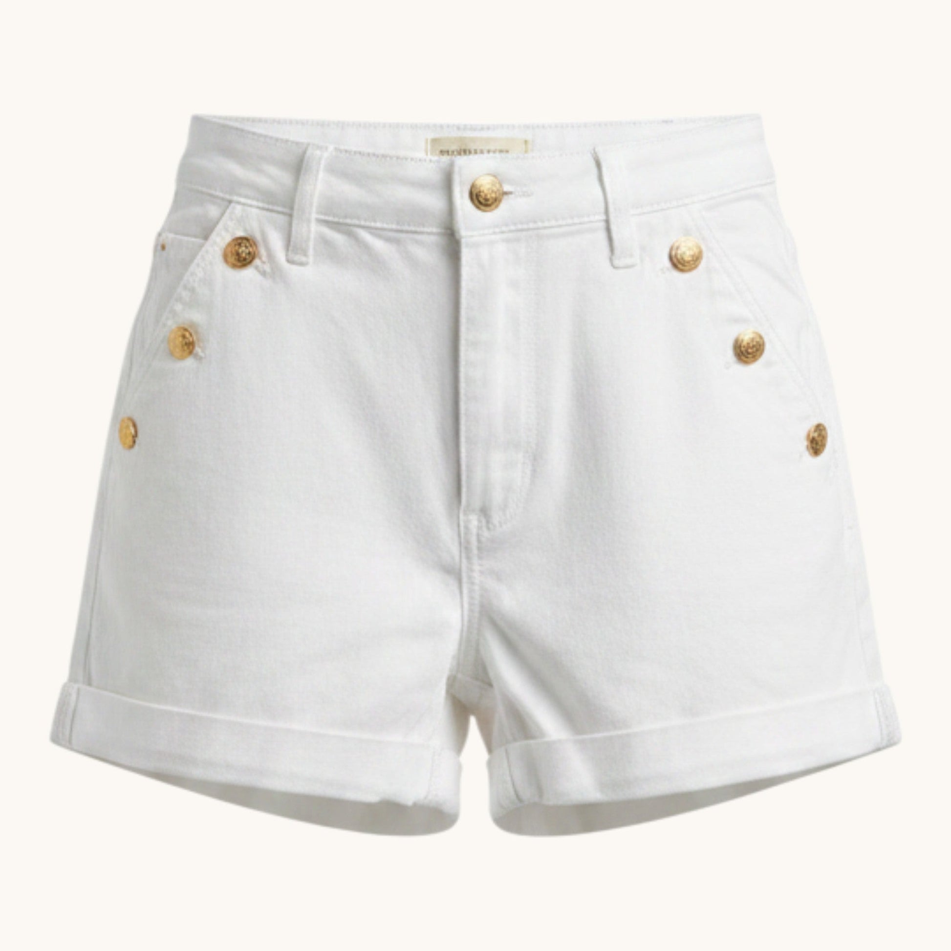Feather & Sole white high-waisted denim shorts with gold-tone button details and cuffed hems.